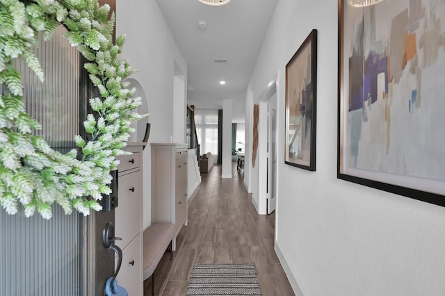 2807 Kingly Pine Trl, Conroe, TX 77385 - hall featuring wood finished floors, recessed lighting, and baseboards