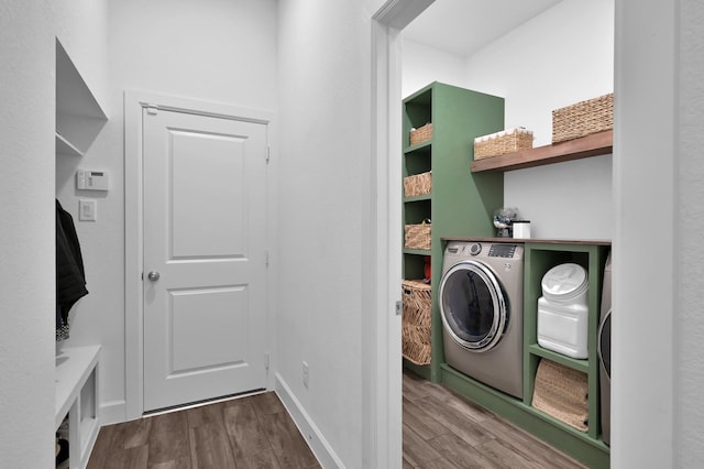 2807 Kingly Pine Trl, Conroe, TX 77385 - laundry room featuring washer / clothes dryer and wood finished floors