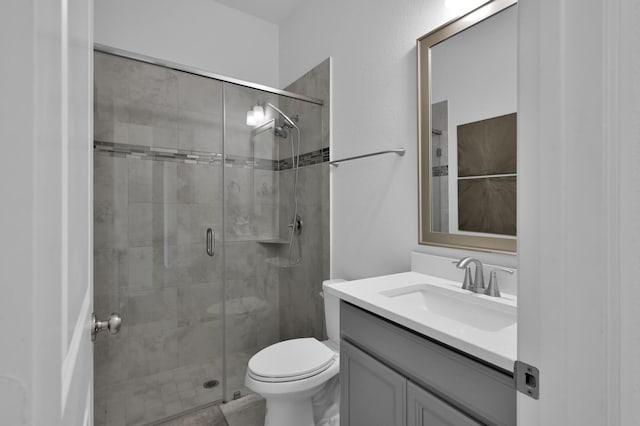 2807 Kingly Pine Trl, Conroe, TX 77385 - full bath featuring a stall shower, vanity, and toilet