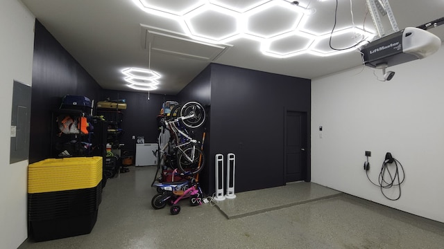 2807 Kingly Pine Trl, Conroe, TX 77385 - garage featuring electric panel and a garage door opener