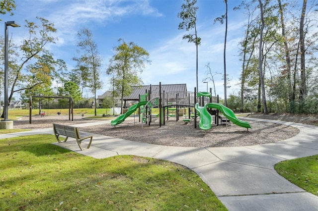 2807 Kingly Pine Trl, Conroe, TX 77385 - community playground featuring a lawn