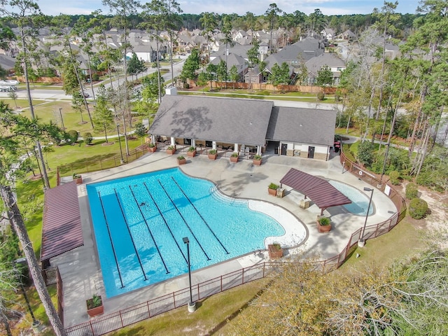 2807 Kingly Pine Trl, Conroe, TX 77385 - view of swimming pool featuring a patio and a residential view