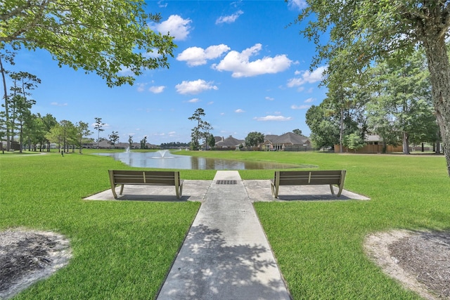 2807 Kingly Pine Trl, Conroe, TX 77385 - view of community featuring a water view, a lawn, and a residential view