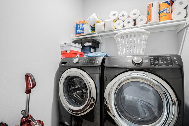10906 Granite Chief Dr, Rosharon, TX 77583 - laundry room with washing machine and clothes dryer