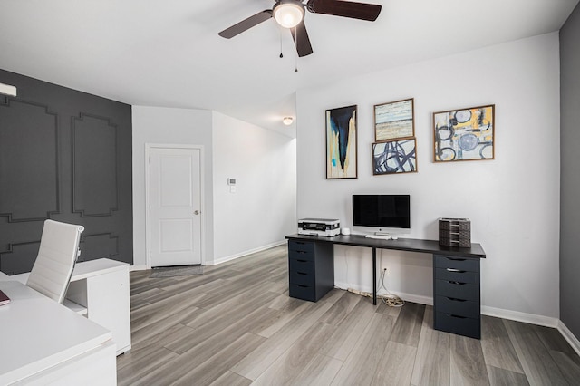 10906 Granite Chief Dr, Rosharon, TX 77583 - office space with ceiling fan, light wood-type flooring, and baseboards