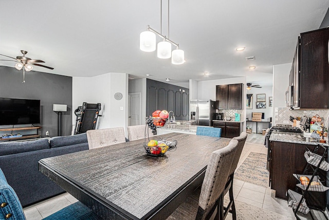 10906 Granite Chief Dr, Rosharon, TX 77583 - dining space featuring ceiling fan, light tile patterned floors, and recessed lighting