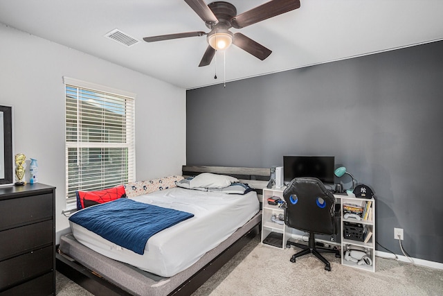 10906 Granite Chief Dr, Rosharon, TX 77583 - carpeted bedroom with ceiling fan, baseboards, and a desk
