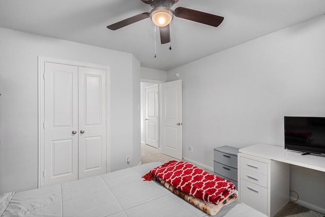 10906 Granite Chief Dr, Rosharon, TX 77583 - bedroom with light colored carpet, baseboards, a ceiling fan, and a closet