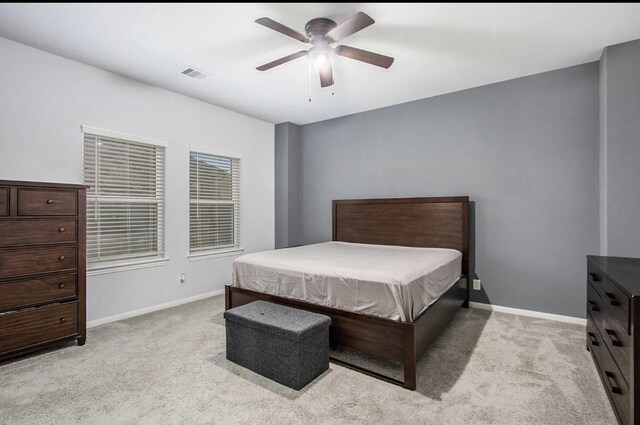 10906 Granite Chief Dr, Rosharon, TX 77583 - bedroom with light colored carpet, baseboards, and a ceiling fan