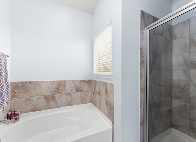 8038 Villa Lago Ln, Houston, TX 77070 - bathroom featuring a stall shower and a bath