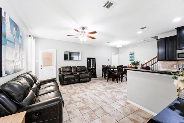 8038 Villa Lago Ln, Houston, TX 77070 - living room featuring a ceiling fan, recessed lighting, stairs, and light tile patterned flooring