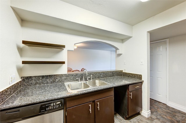 kitchen with dishwasher, a sink, dark brown cabinetry, dark countertops, and open shelves