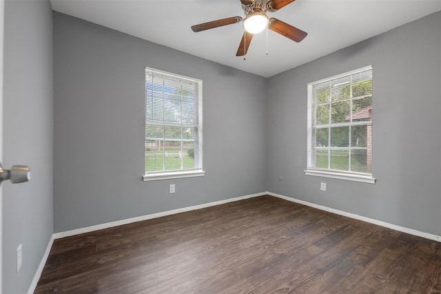 1204 Crescent Blvd, Cleveland, TX 77327 - spare room with dark wood-style flooring, baseboards, and a ceiling fan