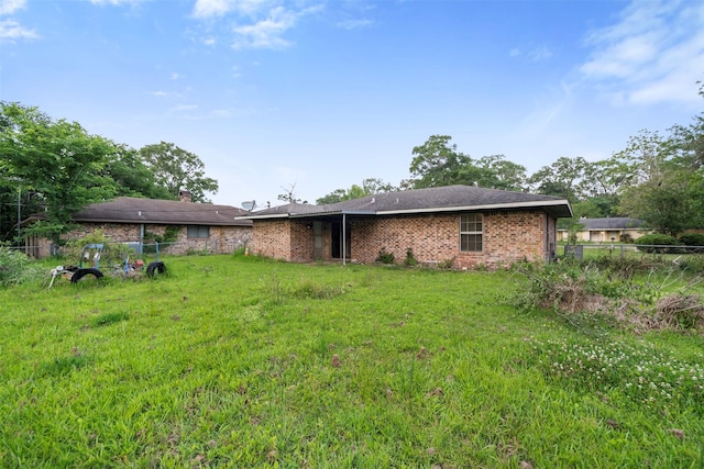 1204 Crescent Blvd, Cleveland, TX 77327 - back of house with brick siding