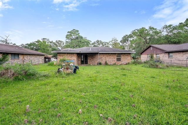 1204 Crescent Blvd, Cleveland, TX 77327 - back of property featuring brick siding