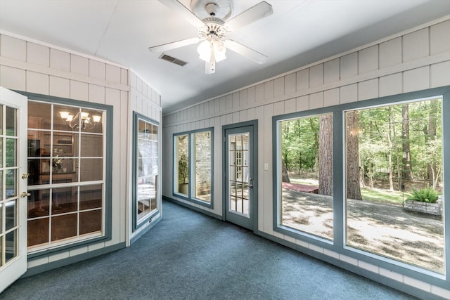 304 Inverness St, Huntsville, TX 77340 - unfurnished sunroom with carpet and wooden walls