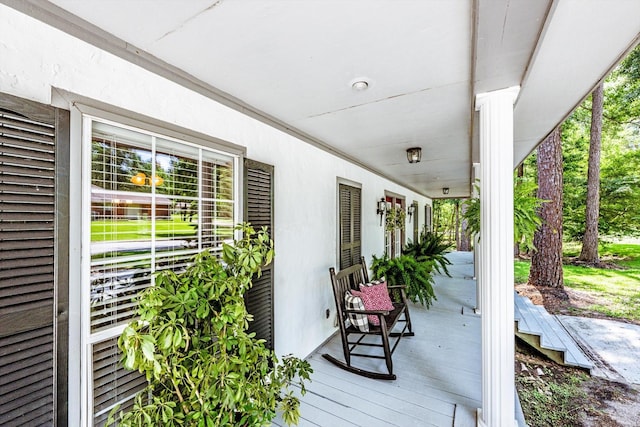 304 Inverness St, Huntsville, TX 77340 - wooden terrace featuring a porch