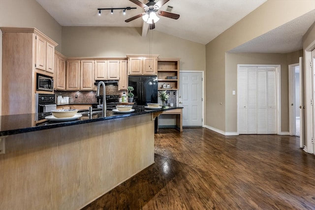 304 Inverness St, Huntsville, TX 77340 - kitchen with black appliances, decorative backsplash, ceiling fan, dark wood finished floors, and lofted ceiling