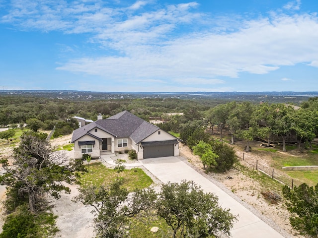 192 Primrose Path, Canyon Lake, TX 78133 - aerial view of property and surrounding area featuring a heavily wooded area