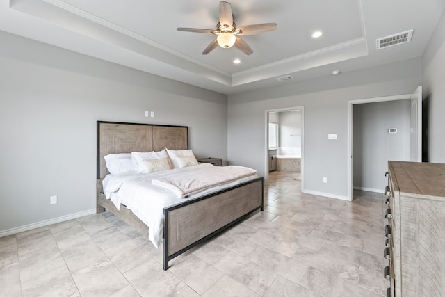 192 Primrose Path, Canyon Lake, TX 78133 - bedroom with a tray ceiling, ornamental molding, recessed lighting, baseboards, and ensuite bathroom