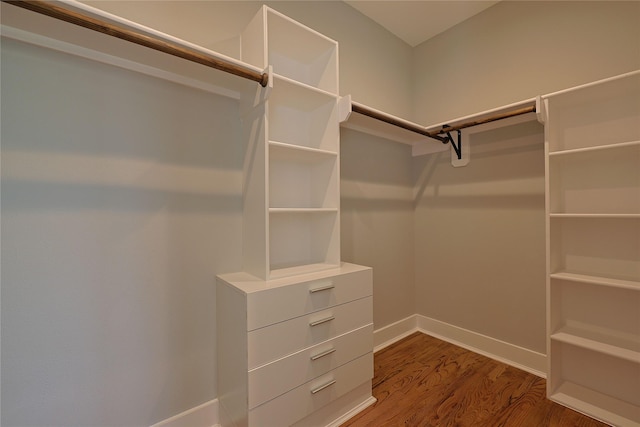 spacious closet with wood finished floors