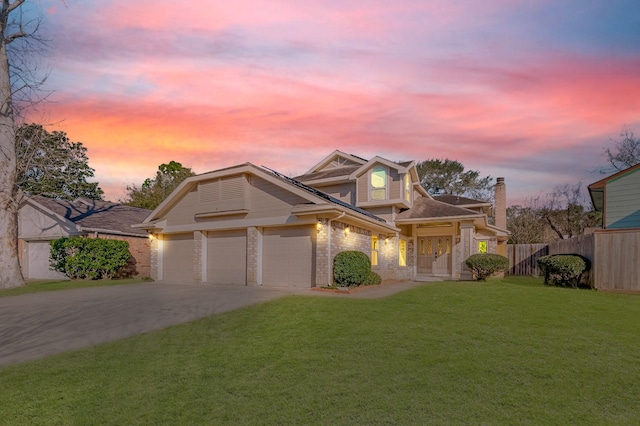 2215 Braesmeadow Ln, Sugar Land, TX 77479 - traditional home featuring driveway, an attached garage, and a chimney