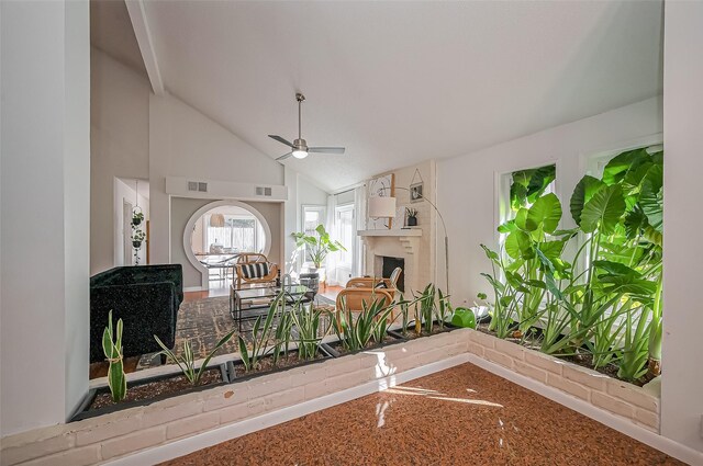 2215 Braesmeadow Ln, Sugar Land, TX 77479 - living room featuring ceiling fan, a fireplace, and high vaulted ceiling