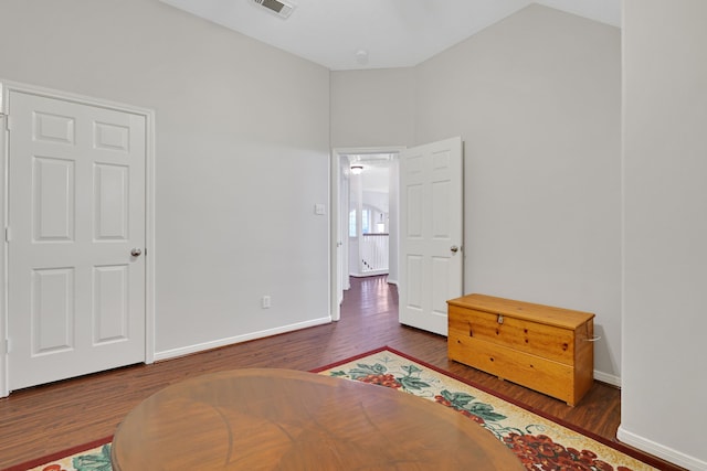 2331 Fern Bend Ln, Katy, TX 77494 - bedroom with wood finished floors, lofted ceiling, and baseboards