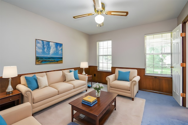 13602 Wendelyn Ln, Houston, TX 77069 - living room with a wainscoted wall, carpet floors, ceiling fan, and wood walls