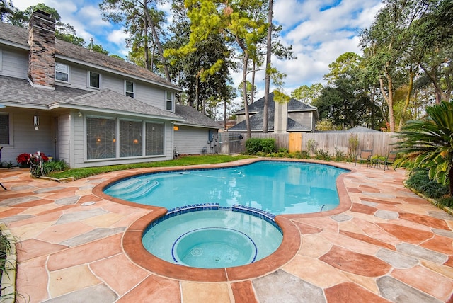 13602 Wendelyn Ln, Houston, TX 77069 - view of swimming pool with a patio area, a fenced backyard, and a pool with connected hot tub