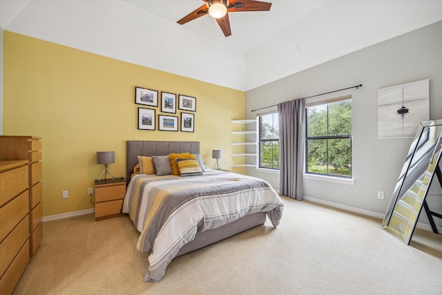 1015 W 41st St, Houston, TX 77018 - bedroom with light carpet, baseboards, and ceiling fan