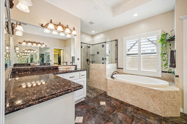 1015 W 41st St, Houston, TX 77018 - full bathroom with a shower stall, a bath, vanity, and recessed lighting
