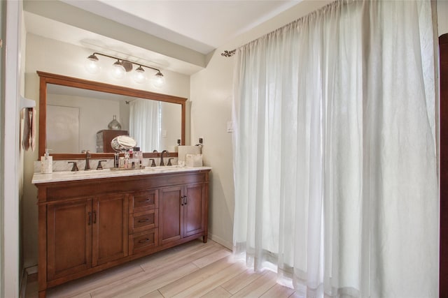1110 Cheshire Ln, Houston, TX 77018 - full bathroom featuring double vanity and wood finished floors