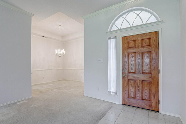5316 Lake Mead Trl, Fort Worth, TX 76137 - entryway featuring a chandelier, ornamental molding, baseboards, carpet flooring, and tile patterned floors