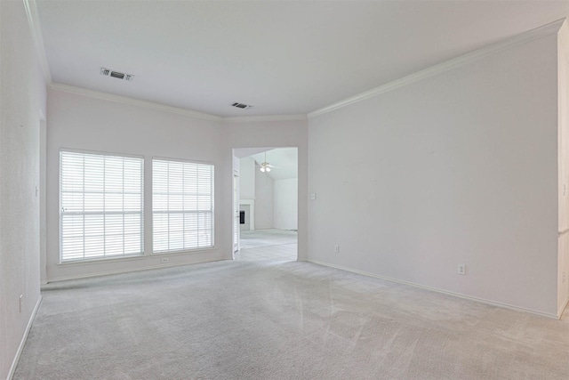 5316 Lake Mead Trl, Fort Worth, TX 76137 - unfurnished room with light carpet, crown molding, ceiling fan, baseboards, and a fireplace