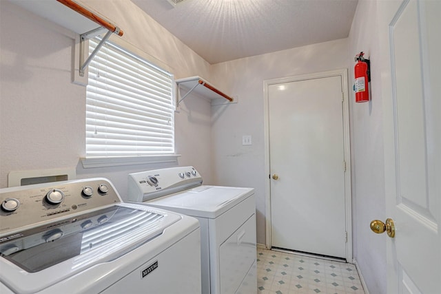 5316 Lake Mead Trl, Fort Worth, TX 76137 - washroom with light flooring and washer and clothes dryer