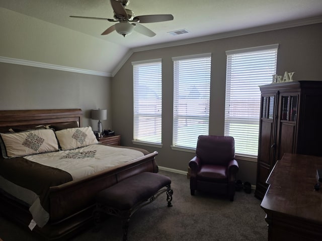 carpeted bedroom with multiple windows, baseboards, vaulted ceiling, ornamental molding, and a ceiling fan