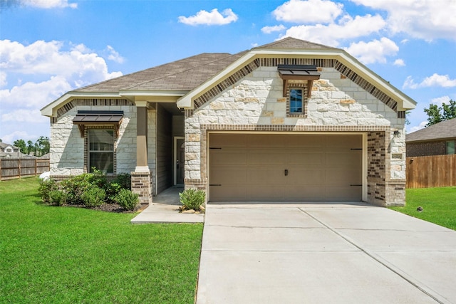 6186 White Oak Leaf Loop, Conroe, TX 77303 - french country home featuring stone siding, driveway, an attached garage, and a shingled roof