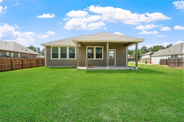 6186 White Oak Leaf Loop, Conroe, TX 77303 - rear view of property with a patio