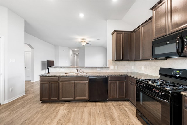 6186 White Oak Leaf Loop, Conroe, TX 77303 - kitchen featuring black appliances, a sink, tasteful backsplash, a ceiling fan, and light wood finished floors
