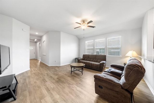 6186 White Oak Leaf Loop, Conroe, TX 77303 - living room featuring ceiling fan, light wood-style floors, and baseboards