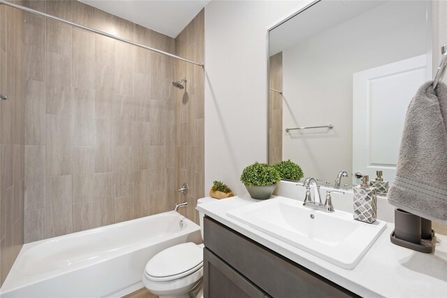1013 Erin St Unit A, Houston, TX 77009 - bathroom featuring toilet, shower / washtub combination, and vanity