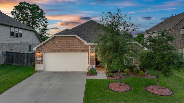 21310 Baldovin Way, Tomball, TX 77375 - view of front facade featuring brick siding, driveway, a garage, and a shingled roof