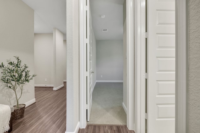 21310 Baldovin Way, Tomball, TX 77375 - corridor with wood finished floors and baseboards