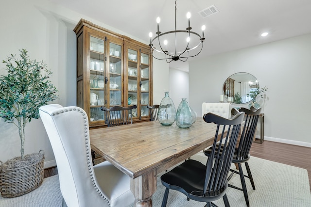 21310 Baldovin Way, Tomball, TX 77375 - dining room featuring a chandelier, wood finished floors, baseboards, and recessed lighting