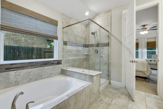 21310 Baldovin Way, Tomball, TX 77375 - bathroom featuring ensuite bathroom, a shower stall, a garden tub, ceiling fan, and baseboards