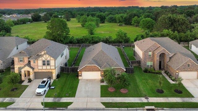 21310 Baldovin Way, Tomball, TX 77375 - aerial view at dusk of a residential view