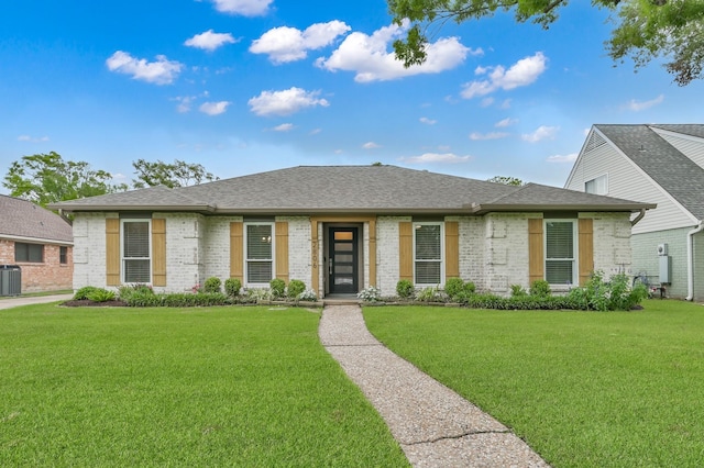 2806 Triway Ln, Houston, TX 77043 - view of front facade with brick siding, central AC unit, a front yard, and roof with shingles