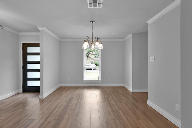 2806 Triway Ln, Houston, TX 77043 - unfurnished room featuring wood finished floors, a chandelier, baseboards, and ornamental molding