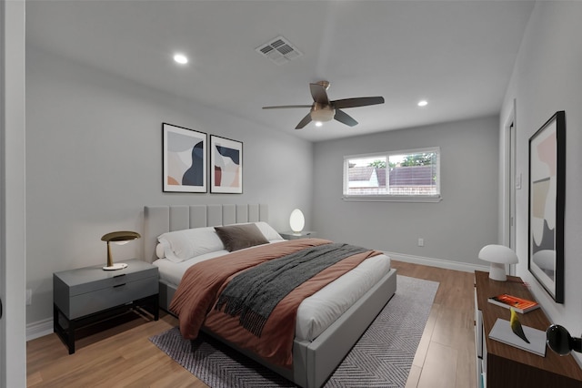 2806 Triway Ln, Houston, TX 77043 - bedroom with recessed lighting, baseboards, light wood-type flooring, and a ceiling fan
